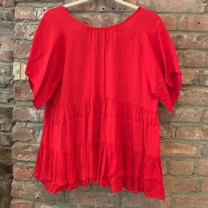 Oversized, flowy blouse.